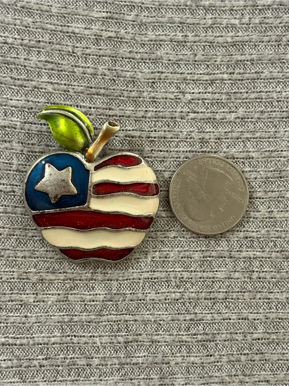 Vintage AJMC marked silver tone American flag apple brooch